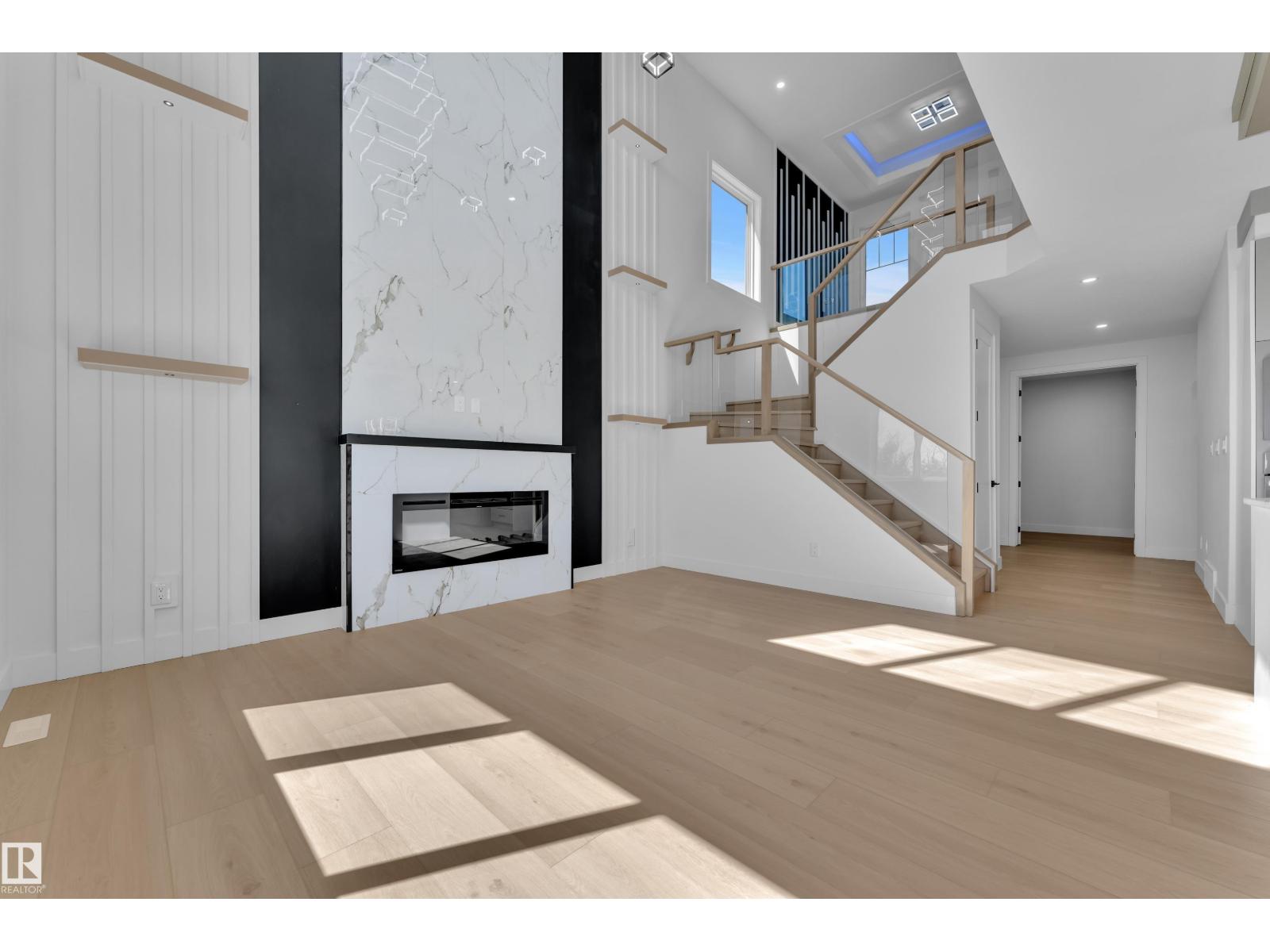 Great room fireplace and staircase