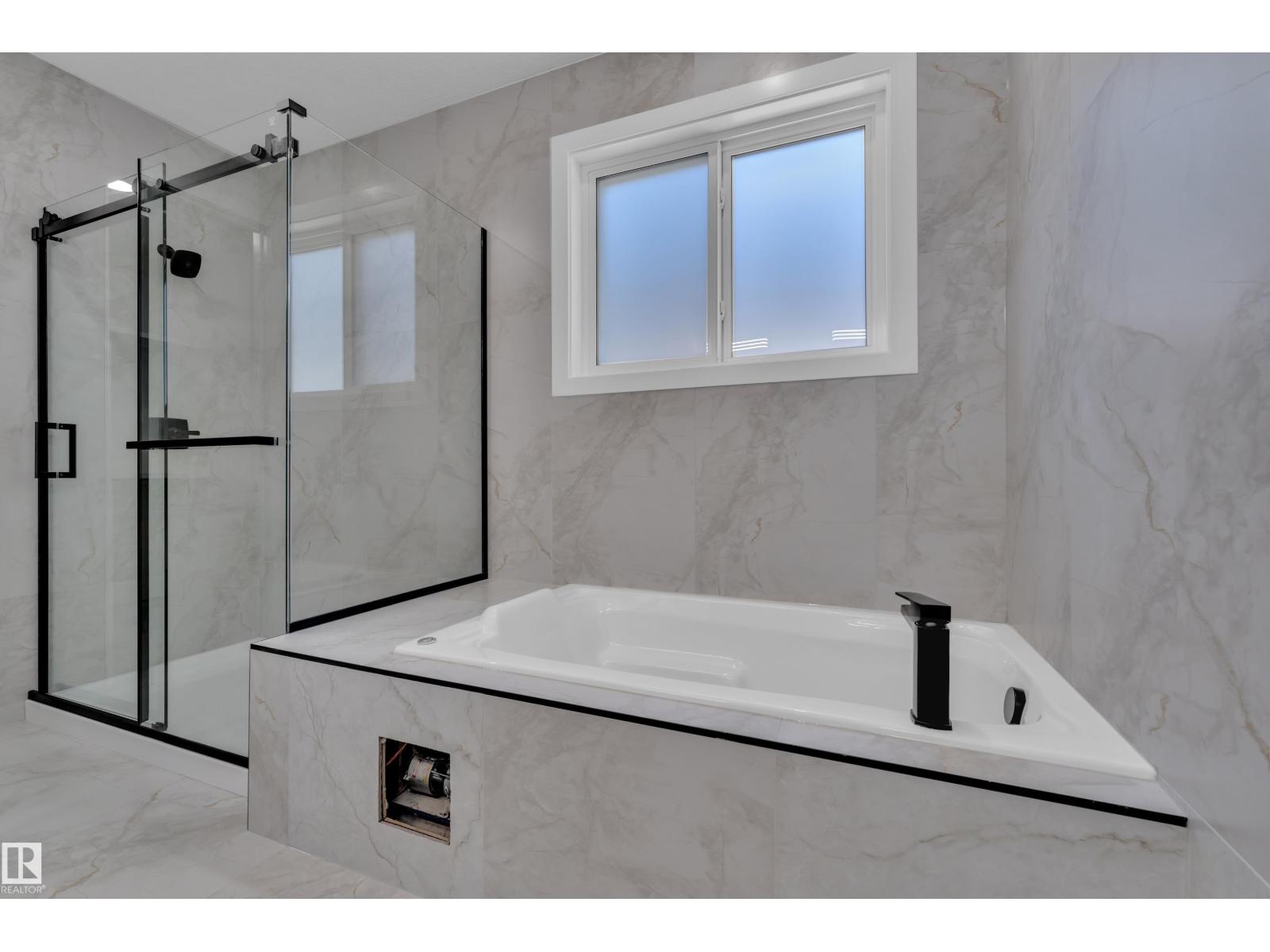 Primary ensuite with freestanding tub