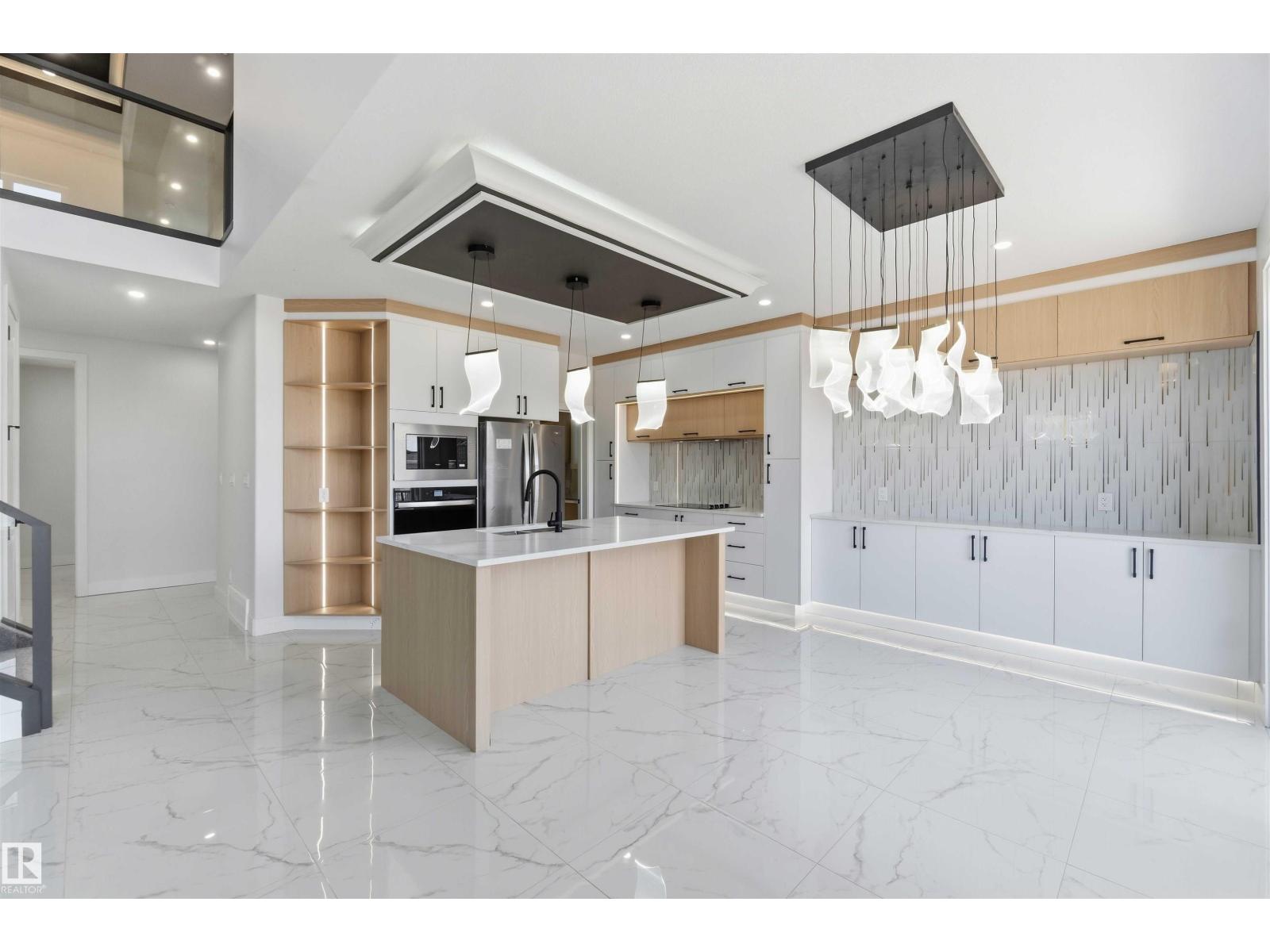 Kitchen with statement pendant lighting