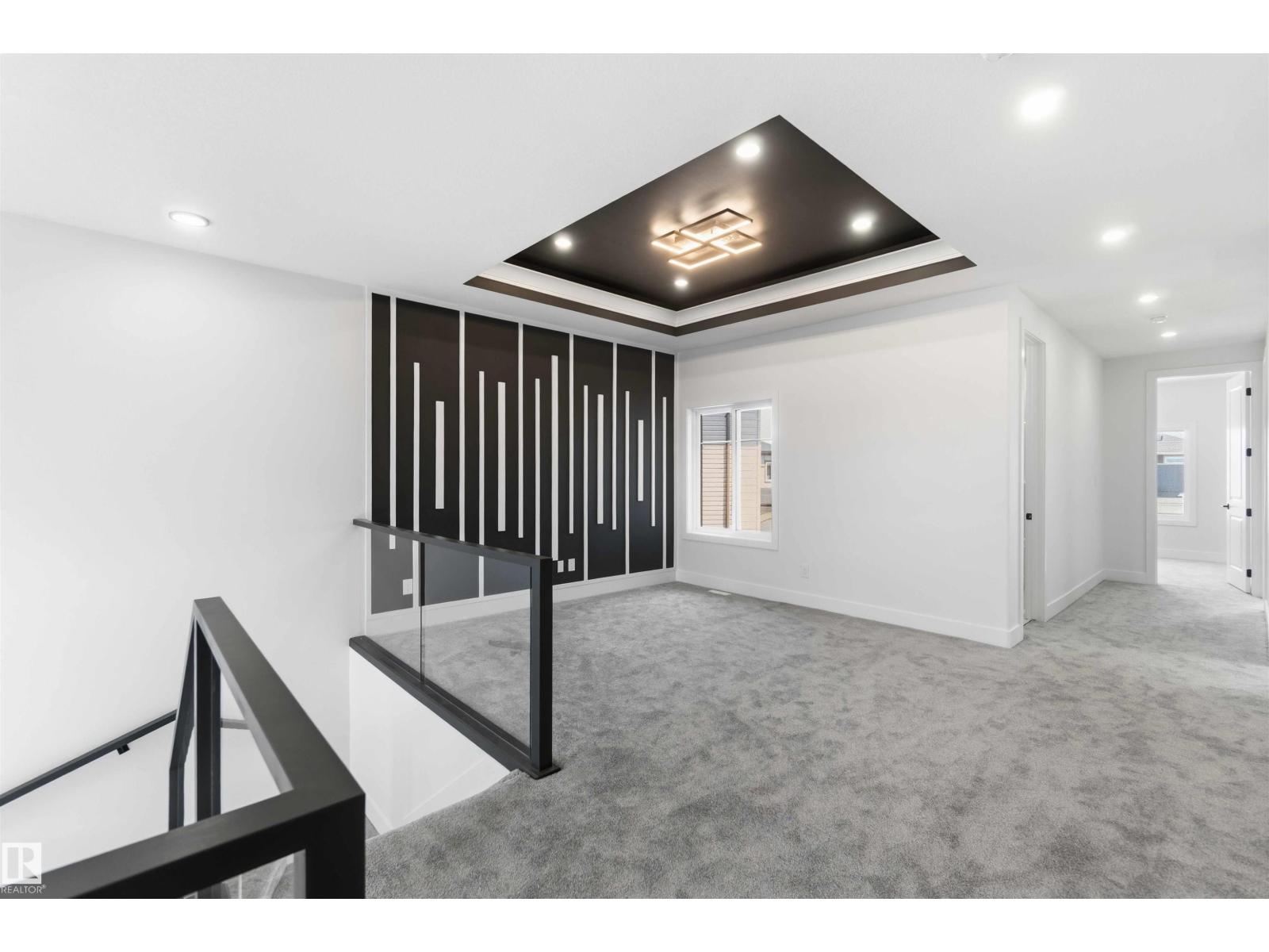 Upper landing with dark accent wall