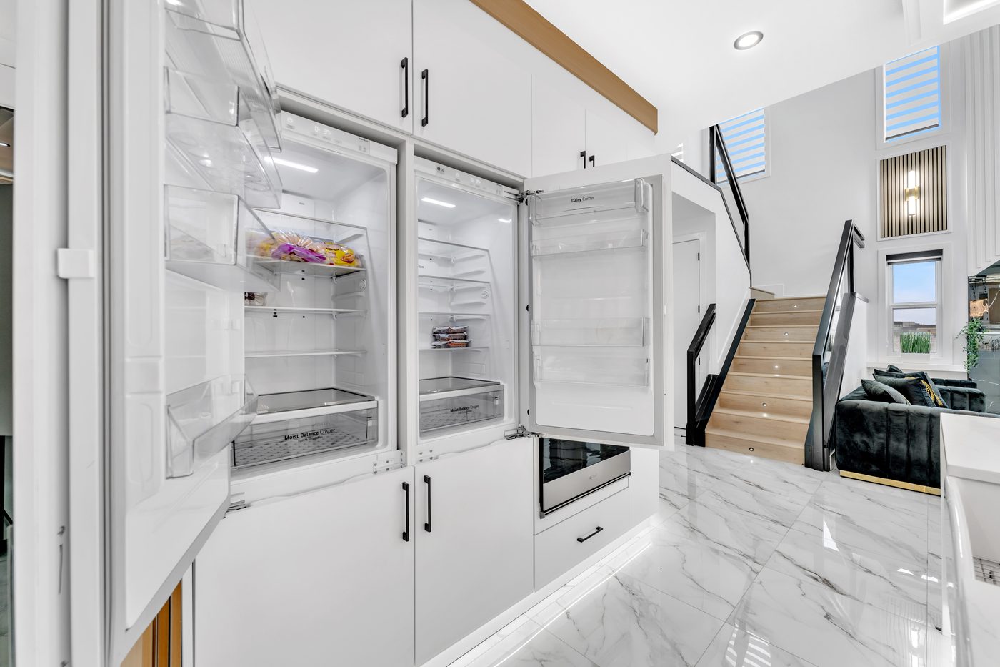 Great room open to kitchen and stairs